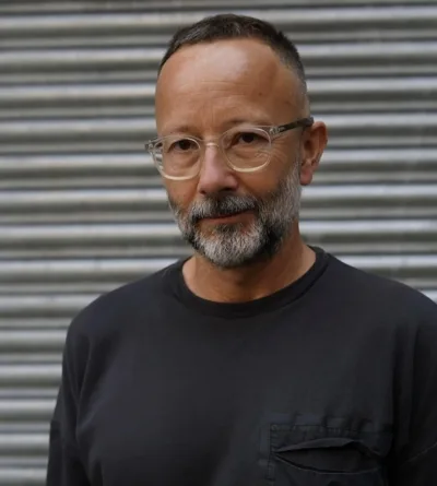 Headshot of author Tom Dyckhoff