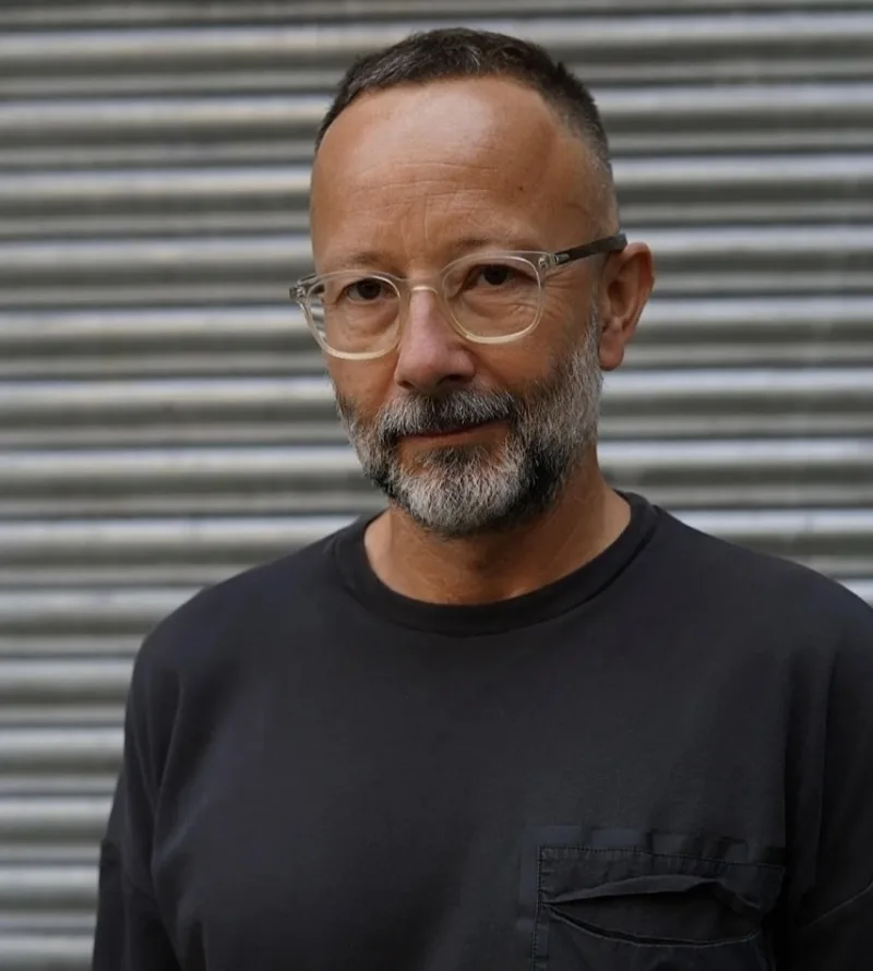 Headshot of author Tom Dyckhoff