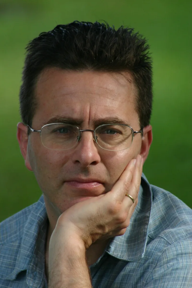 Headshot of author Jon Stock