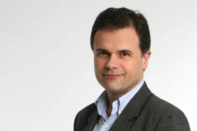 Headshot of author Oliver Kamm
