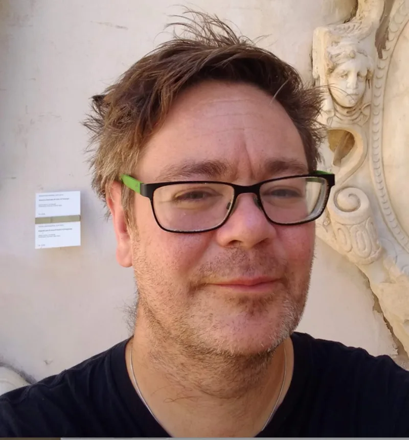 Headshot of author Benjamin T Smith