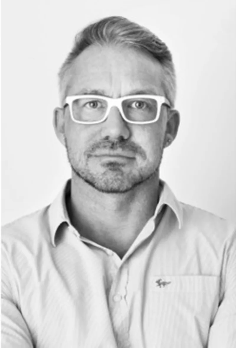 Headshot of author Paul Dolan