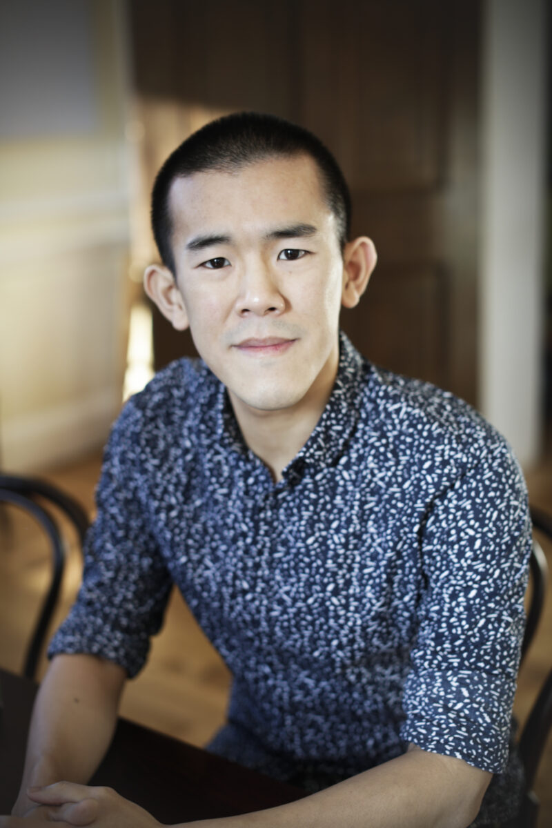 Headshot of author Ed Yong